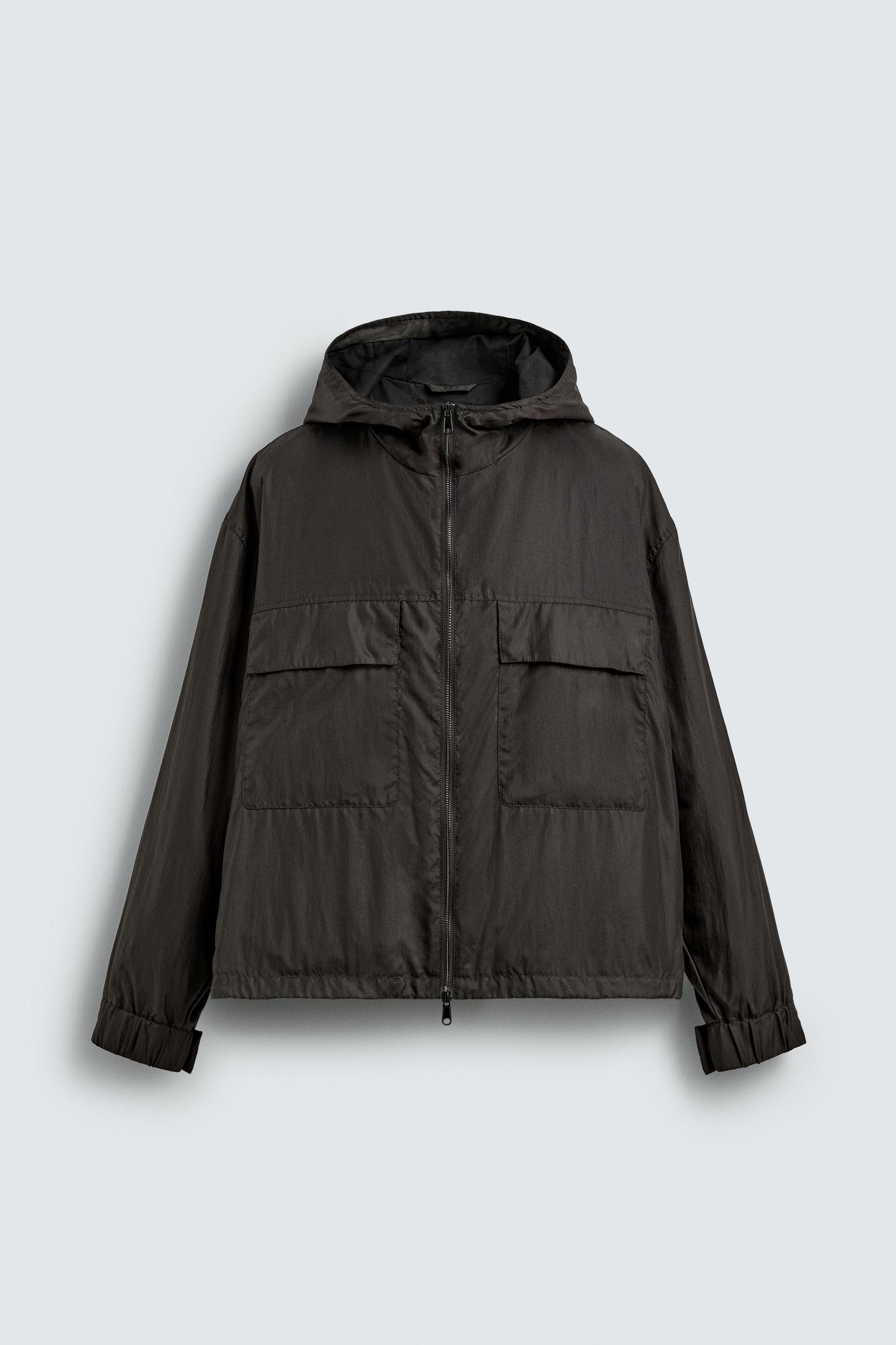 BLOUSON TECHNIQUE À CAPUCHE